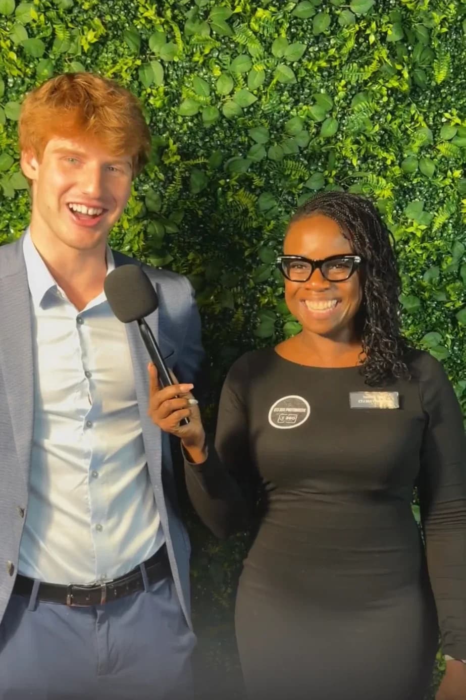 Rowan Frew interviewing an agent at an industry event